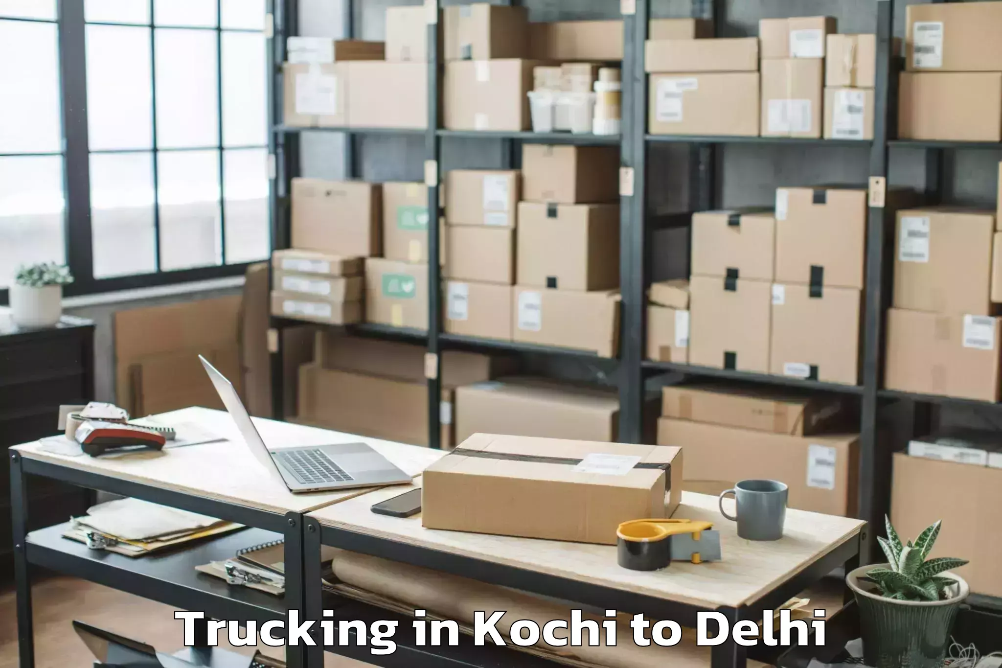 Book Kochi to Defence Colony Trucking Online